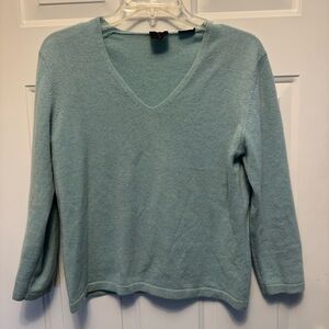 MAG Woman’s 100% Cashmere teal sweater.
